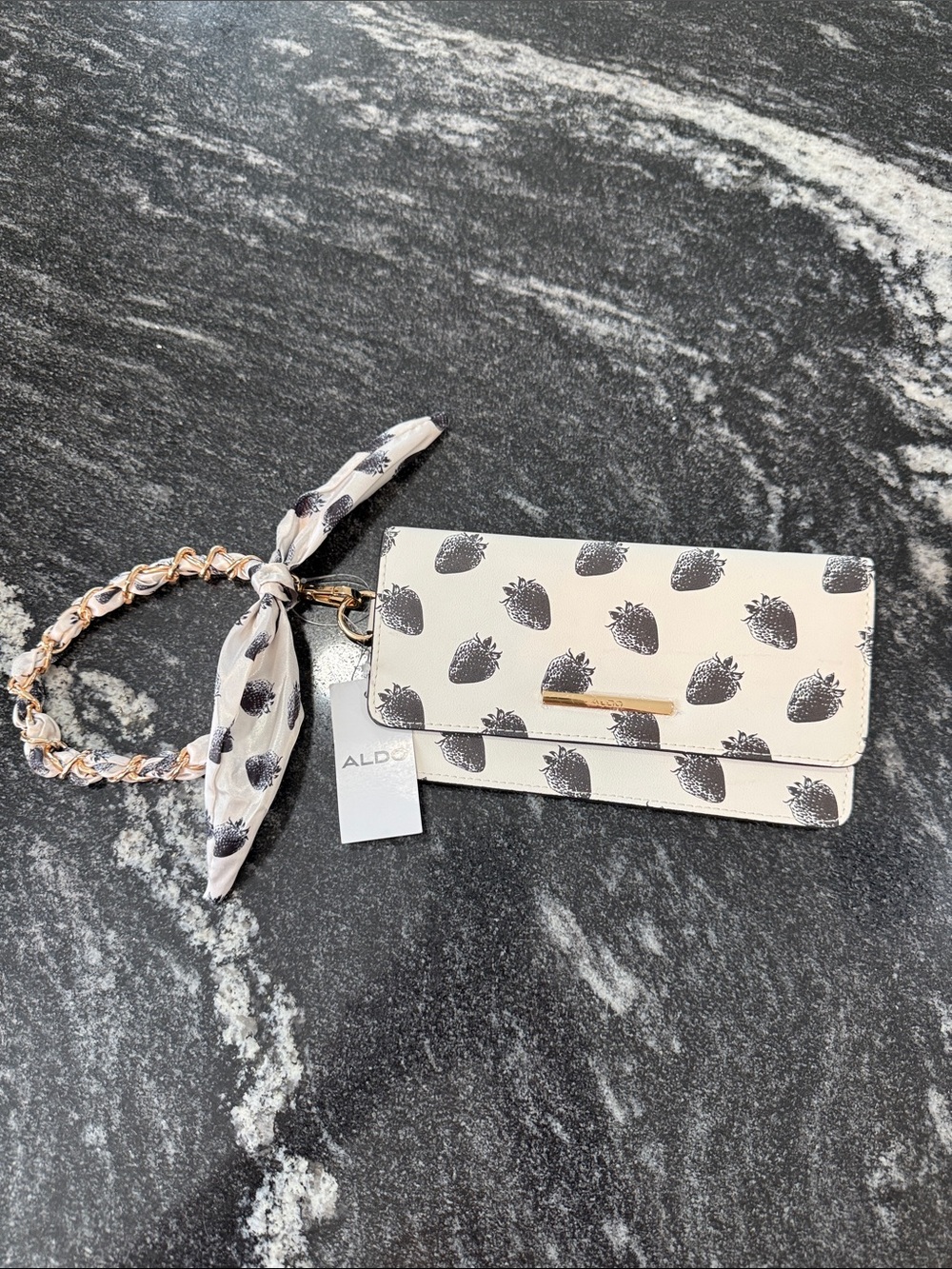 ALDO Cream Wristlet with Black Strawberry Print and Gold Chain